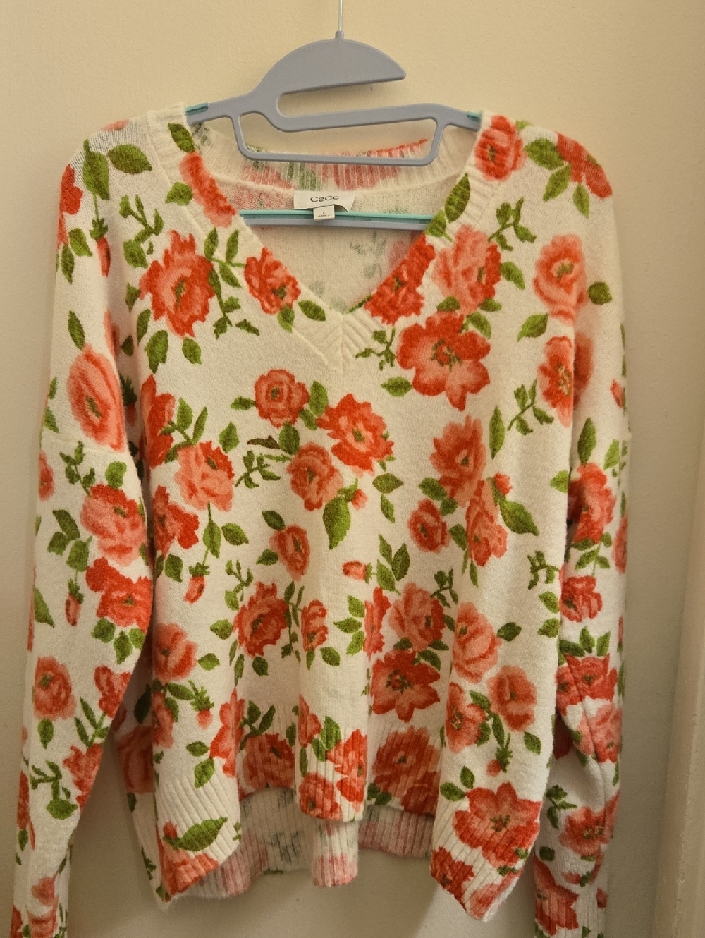 CeCe White V-Neck Sweater with Pink Rose Print